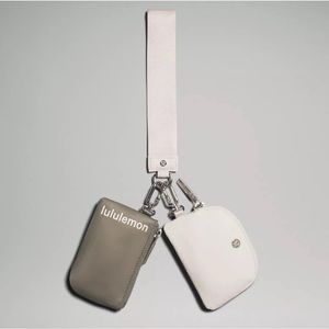 Lululemon Dual Pouch Wristlet - White Opal / Gray Sage (Seasonal Color)